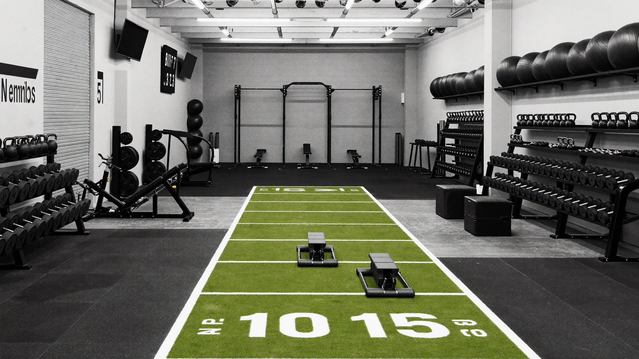 Members training in a hyrox-style gym
